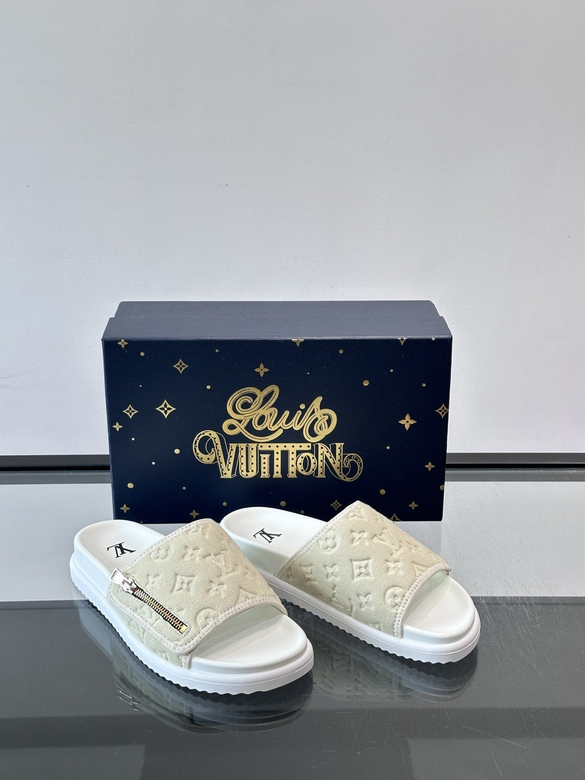 Louis Vuitton Embossed Monogram Slide Sandals